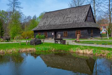 Obraz premium Wooden cottages at Pszczyna open-air museum in Poland