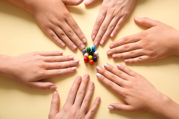 People with pawns on beige background. Inclusion concept