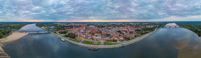 Sunset panorama of Torun in Poland © dudlajzov