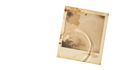 Aged instant photo print with vintage texture and worn appearance.