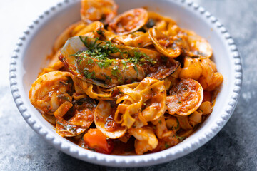 italian seafood pasta in tomato sauce