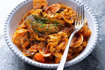 italian seafood pasta in tomato sauce