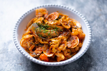 italian seafood pasta in tomato sauce