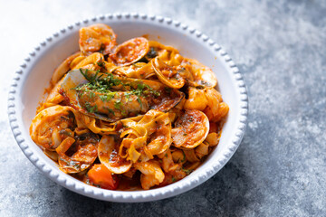 italian seafood pasta in tomato sauce