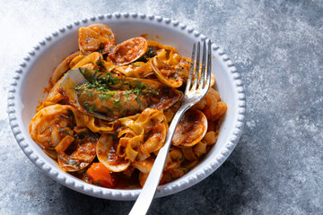 italian seafood pasta in tomato sauce
