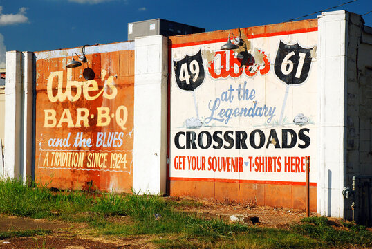 Historic billboards for a barbeque cafe and restaurant line an empty lot in near the diner location in Clarksdale, Mississippi