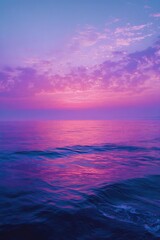 Fototapeta premium Blurry sunset over a tranquil sea