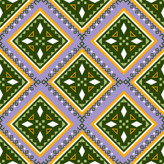 Ethnic aztec geometric seamless pattern in green and purple with tribal motifs, abstract decorative textile design for fabric, fashion, wallpaper, wrapping and cultural backgrounds.