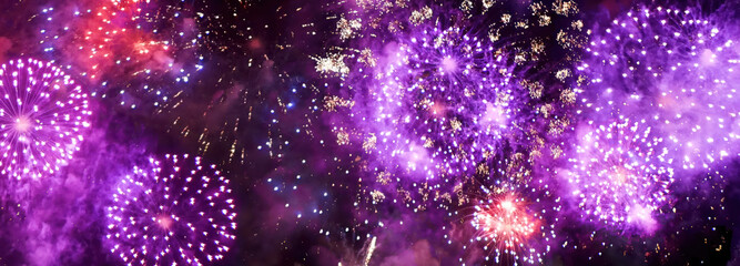 Banner Purple Firework celebrate anniversary happy new year 2025, 4th of july holiday festival. Banner Purple firework night time National holiday. Violet firework New year 2026 festival copy space