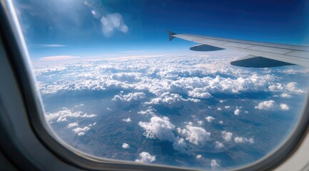 Obraz premium Airplane window view of clouds and earth