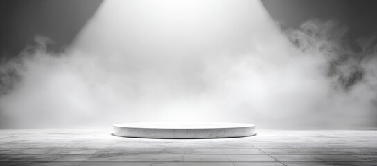 Spotlight on platform, fog