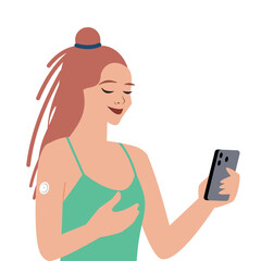 Waist-up portrait of young redhead woman wearing continuous glucose monitor attached to the upper part of her arm, checking records in smartphone application