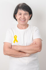 Elderly with Yellow Ribbon for concept of yellow September, Suicide prevention day, Childhood, July...