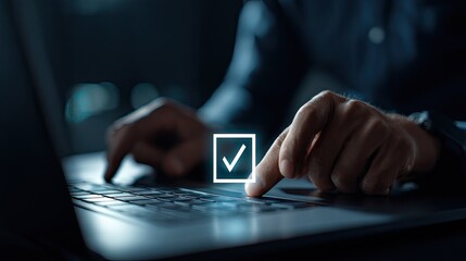Person using a laptop computer with a check mark icon.