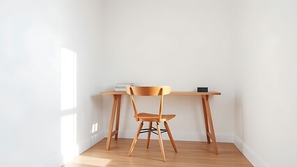 A clean and simple office corner featuring a wooden desk and chair under soft natural light.
