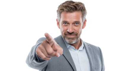 Confident man pointing forward, wearing a gray jacket against a white background.