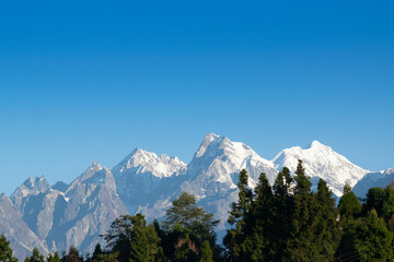 From left - Mount South Kabru (24215 feet), Mount North Kabru and Mount Talung (24200 feet) - beautiful view of Himalayan mountains at Ravangla, Sikkim. Himalaya is the great mountain range in Asia .