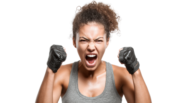 Powerful athlete celebrating victory with fists raised and fierce expression, isolated on white background.
