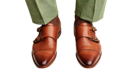 Stylish brown dress shoes on a well-dressed person, enhancing elegance and sophistication.