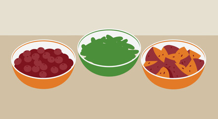 Three bowls hold cranberries spinach  cut sweet potatoes