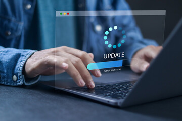 Person using laptop to update and upgrade system software for modernize, released new version and...
