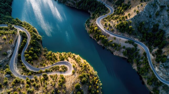 Winding road by a turquoise lake - Powered by Adobe