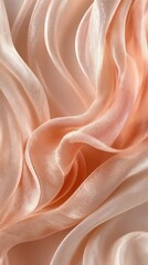 Soft, peach-toned silk fabric drapes