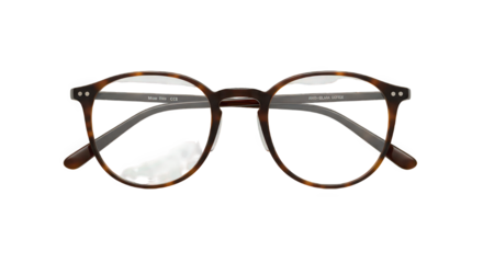 Close up of tortoise shell eyeglasses with clear lenses on a black background in studio light