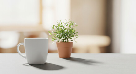 White mug and small potted plant sitting on a table in a bright room setting