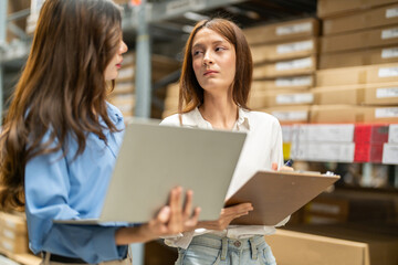 Female engineers team discussing inventory in warehouse logistics and supply chain planning, operation management, data analysis, warehouse shipping, inventory tracking, optimization and technology