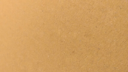 Background of brown kraft paper or cardboard texture. Brown recycled paper texture background.
