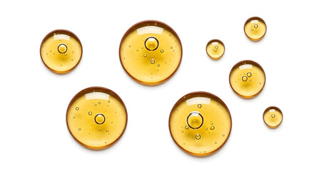 Fototapeta premium Discover luxurious golden serum drops with tiny bubbles, perfect for beauty and skincare advertising.