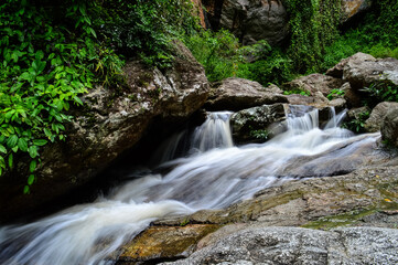 Fototapeta premium Huay Kaew Waterfall in the rainy season at Doi Suthep-Pui National Park,Chiang mai, Northern Thailand.
