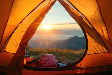 Sunrise view from a mountain camping tent.