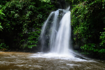 Obraz premium Mon Tha Than Waterfall or Montha Than Waterfall in the rainy season at Doi Suthep-Pui National Park,Chiang mai, Northern Thailand.