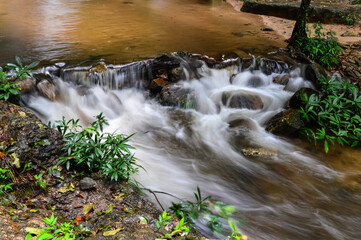 Rapids and streams in Mon Tha Than Waterfall or Montha Than Waterfall in the rainy season at Doi...