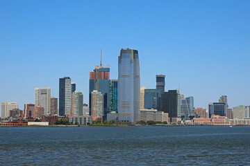Obraz premium Jersey City and New Jersey skyline seen from the Hudson River with the Goldman Sachs skyscraper other modern buildings