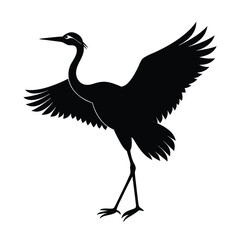 Silhouette of a crane with wings spread