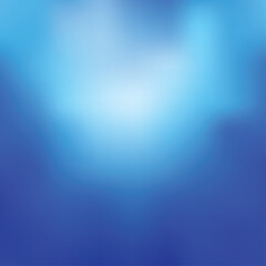 Abstract blue gradient background with bright light in the center