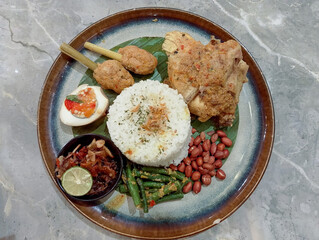 Traditional Indonesian Food with chicken and satay
