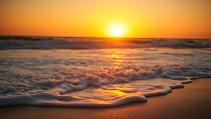 Fototapeta premium Sunset beach scene with golden light, evoking relaxation and natural beauty.