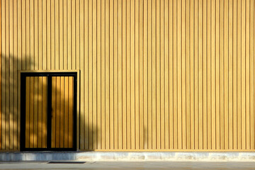 Walls and door frames decorated with imitation wood materials copy space