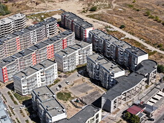 Almaty, Kazakhstan - 08.29.2025 : Multi-storey residential buildings on the outskirts of the city.