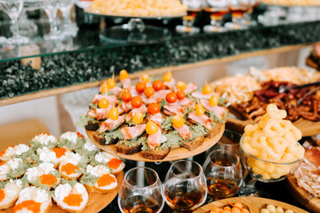 Elegant buffet spread featuring gourmet appetizers at a festive gathering in a stylish venue