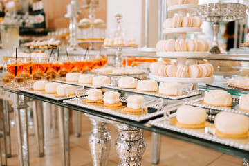 Elegant dessert display at a stylish event featuring various sweet treats