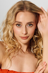 Fototapeta premium Captivating beauty shines through stylish curls in a vibrant fashion setting