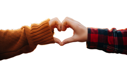 Two hands, one in a knitted orange sleeve and the other in a plaid shirt, form a heart shape with fingers, set against a blurred autumnal background with a bright orange sun.