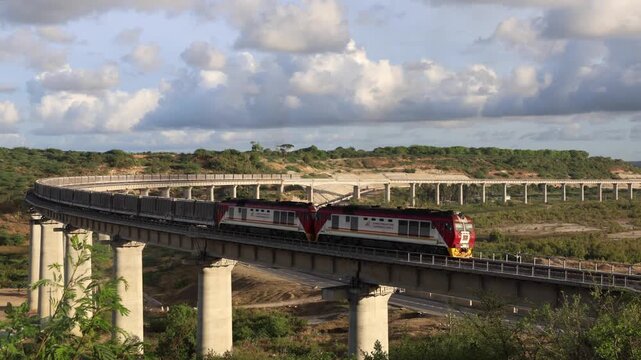 A standard gauge railway train carrying containers of cargo from the port of Mombasa.