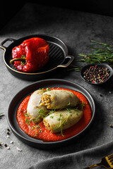 squid stuffed with rice with tomato and pepper sauce