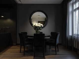 Dark dining room with round mirror and white flowers.